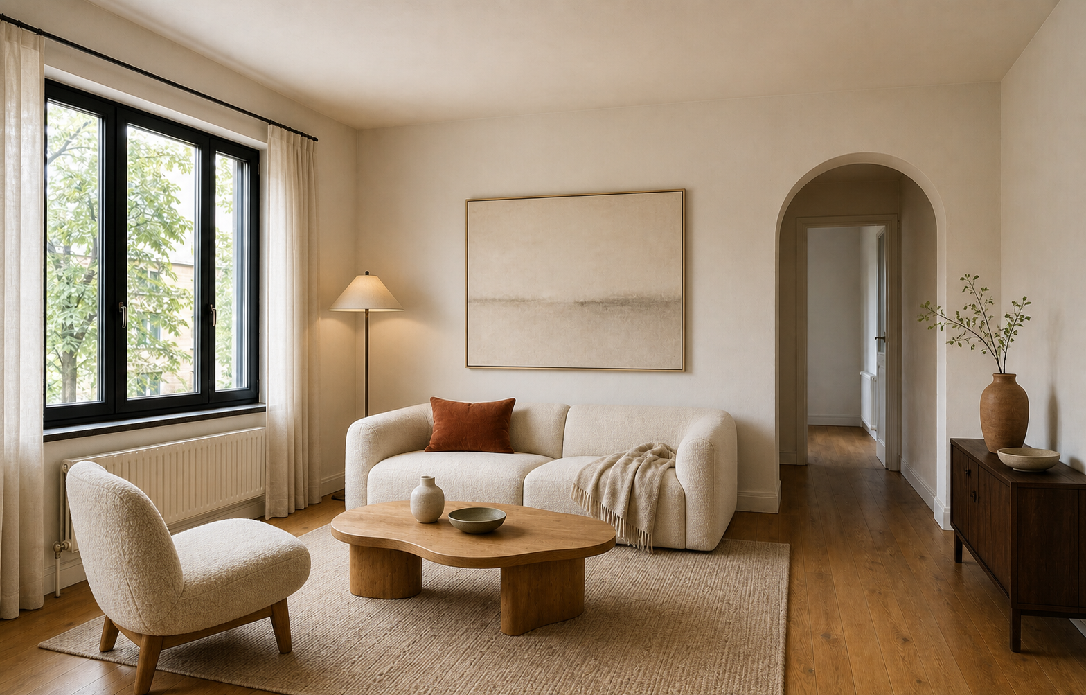 The same living room redesigned: linen curtains, a cream boucle sofa, an oak table and the original sideboard kept